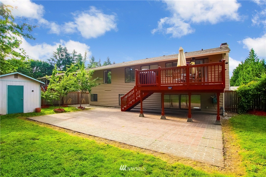 21928 8th Place West Bothell, WA 98021 - Photo 27 of 31 a view of a house with backyard and sitting area