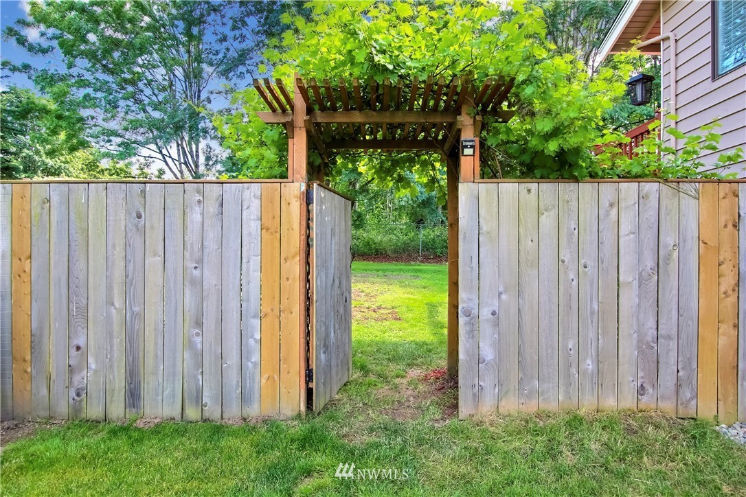 21928 8th Place West Bothell, WA 98021 - Photo 29 of 31 a view of a backyard with a trees and plants