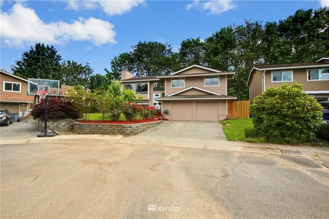 21928 8th Place West Bothell, WA 98021 - Photo 31 of 31 front view of a house with a street
