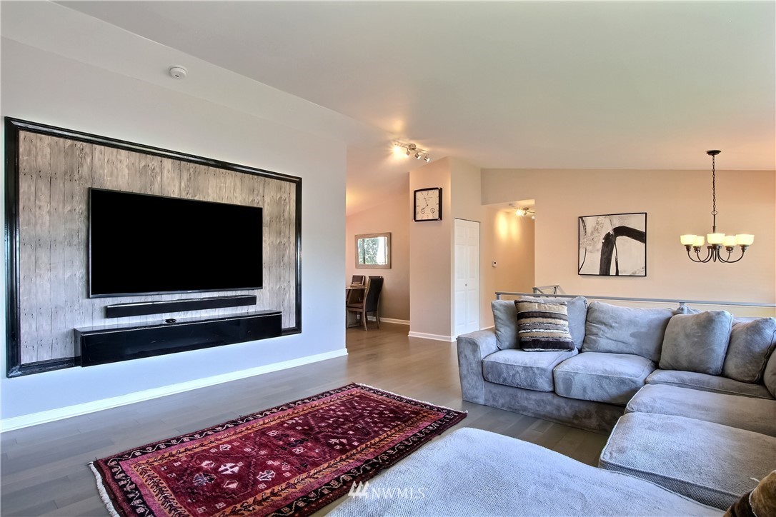 21928 8th Place West Bothell, WA 98021 - Photo 5 of 31 a living room with furniture and a flat screen tv