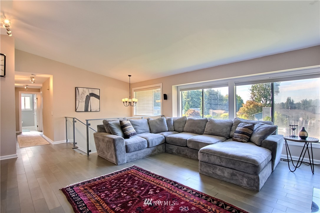 21928 8th Place West Bothell, WA 98021 - Photo 6 of 31 a living room with furniture and a rug