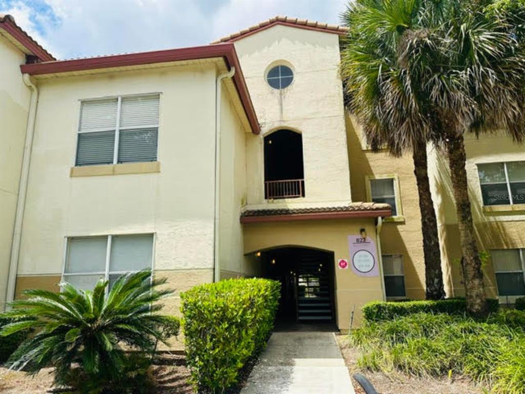 822 Camargo Way, Unit 204 Altamonte Springs, FL 32714 - Photo 1 of 32 a front view of a house with garden