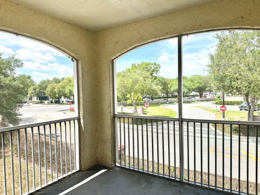 822 Camargo Way, Unit 204 Altamonte Springs, FL 32714 - Photo 25 of 32 a view of a city street from a balcony