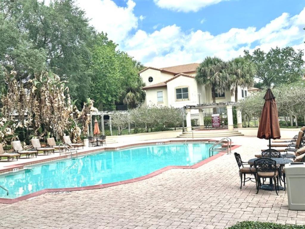 822 Camargo Way, Unit 204 Altamonte Springs, FL 32714 - Photo 28 of 32 a view of a house with pool and sitting area