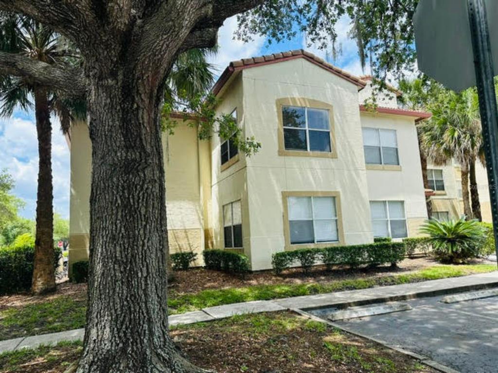 822 Camargo Way, Unit 204 Altamonte Springs, FL 32714 - Photo 3 of 32 a front view of a house with garden
