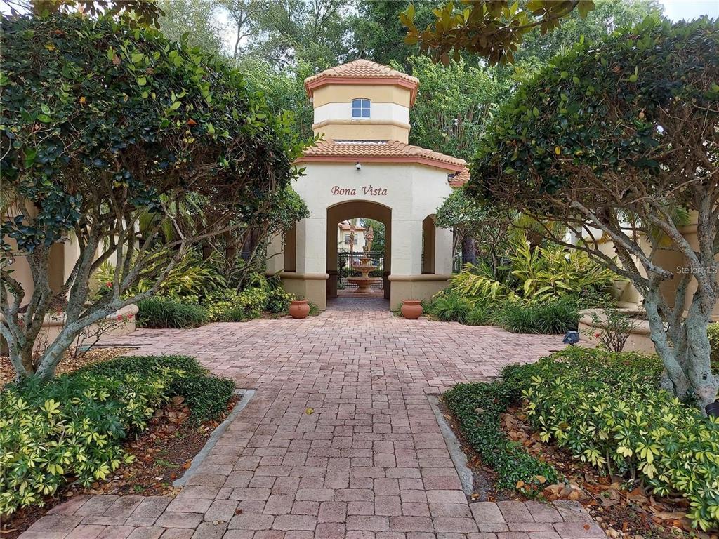 822 Camargo Way, Unit 204 Altamonte Springs, FL 32714 - Photo 5 of 32 a front view of a house with a garden