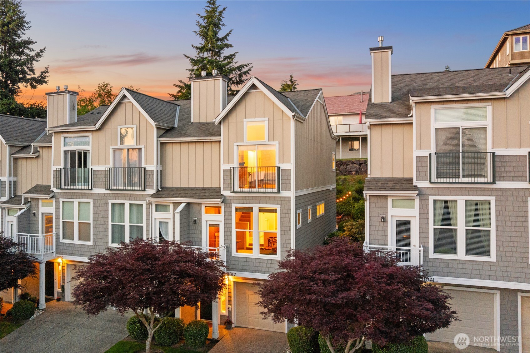 11017 Villa Rosa Lane Mukilteo, WA 98275 - Photo 3 of 37 a view of a big house with fountain and porch