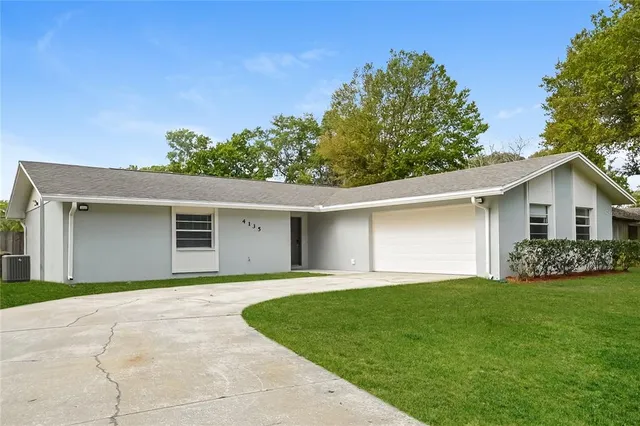 a house view with a garden space