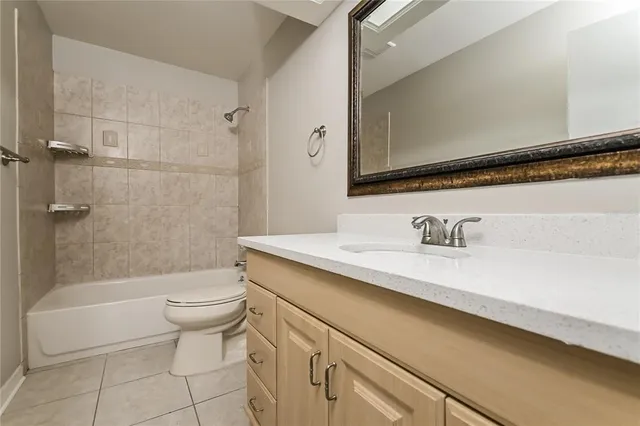 a house view with a sitting space and garden