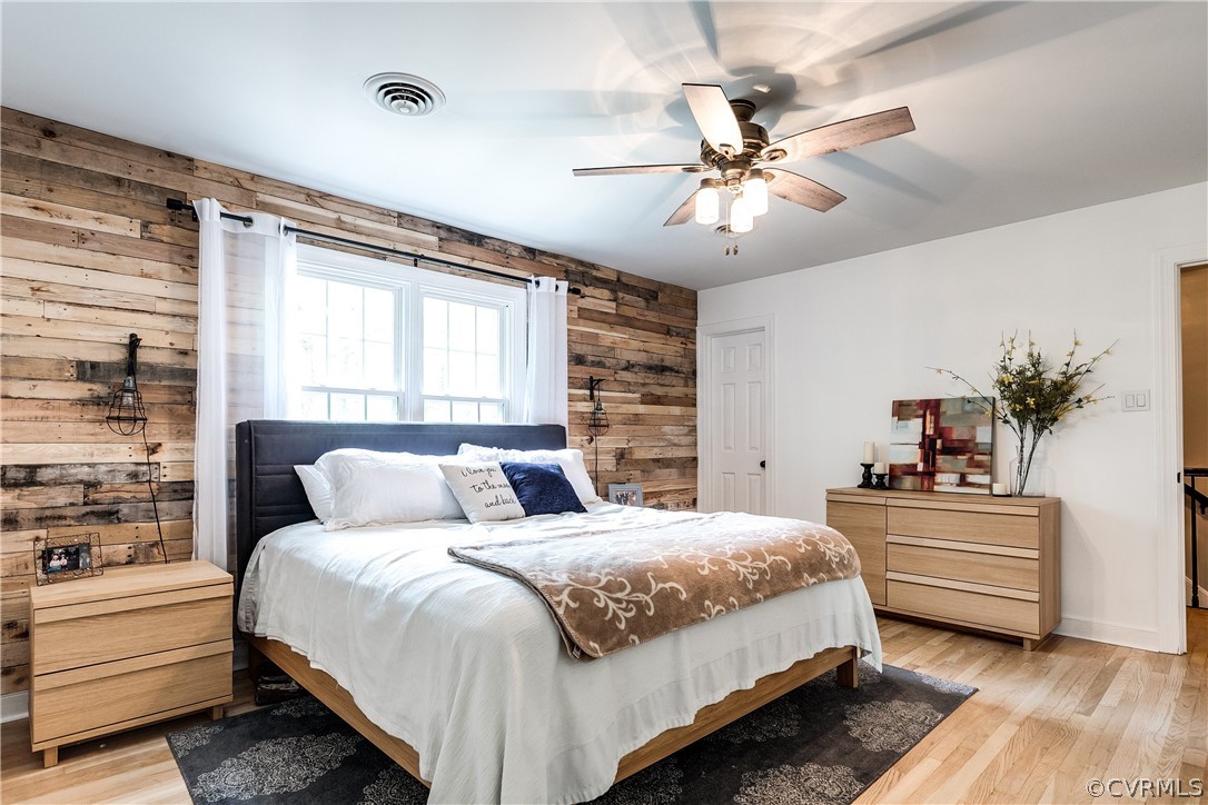 2340 Pathfinder Circle Richmond, VA 23294 - Photo 11 of 23 a bedroom with a large bed and a chandelier