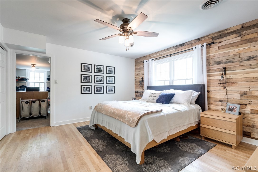 2340 Pathfinder Circle Richmond, VA 23294 - Photo 12 of 23 a bedroom with a bed and a chandelier