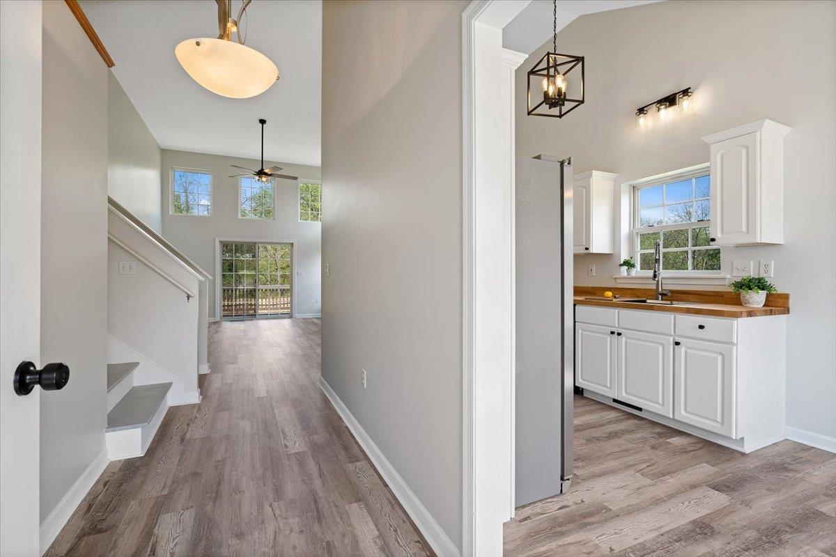 216 Kingsport Road Waynesboro, VA 22980 - Photo 8 of 50 a kitchen with wooden floor and window