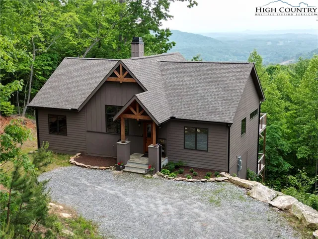 a house with a wooden fence