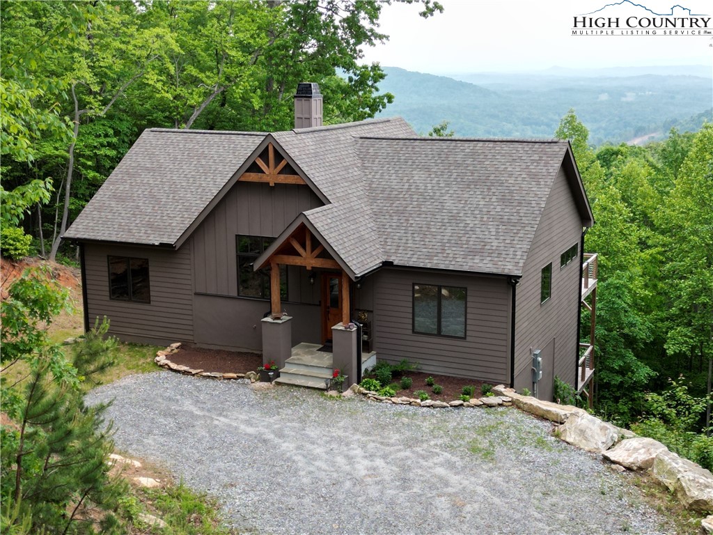 a house with a wooden fence