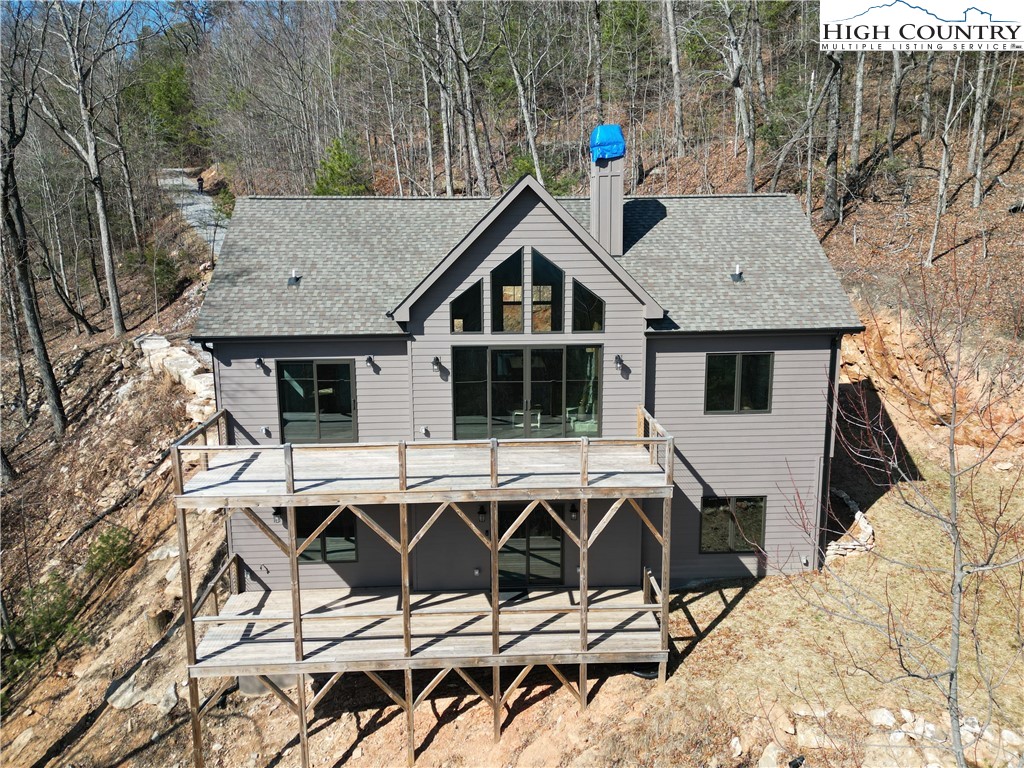 414 Elk Horn Road Ferguson, NC 28624 - Photo 16 of 27 a house with a outdoor space
