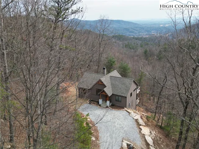 a house view with a backyard space