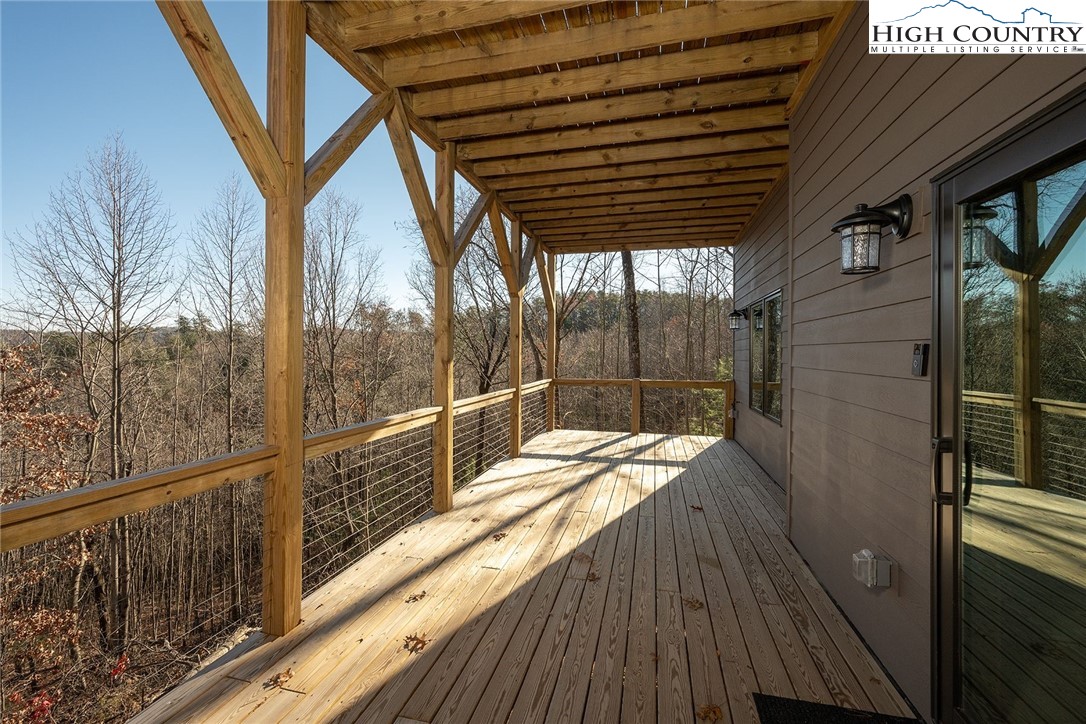 414 Elk Horn Road Ferguson, NC 28624 - Photo 8 of 27 a view of outdoor space with wooden deck