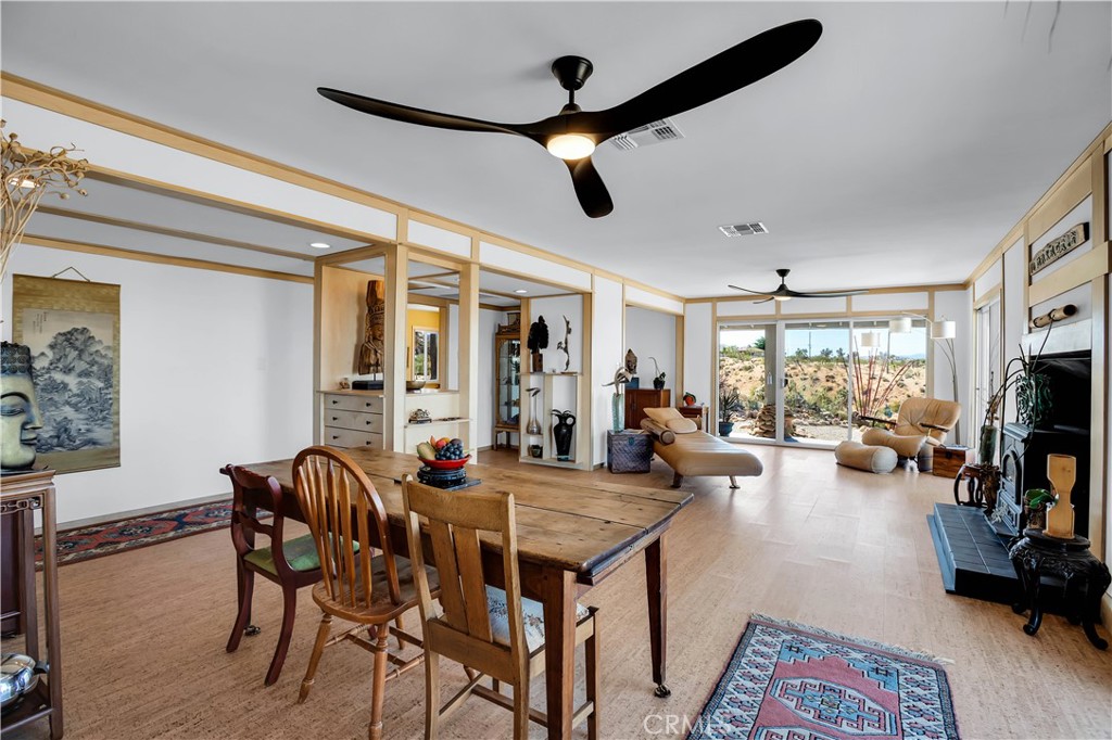 59489 Onaga Trail Joshua Tree, CA 92252 - Photo 14 of 73 a view of a livingroom with furniture and a flat screen tv