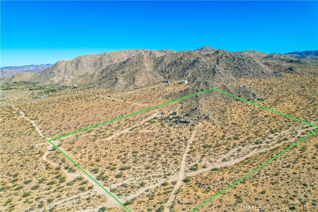 59489 Onaga Trail Joshua Tree, CA 92252 - Photo 72 of 73 a view of a yard with a mountain