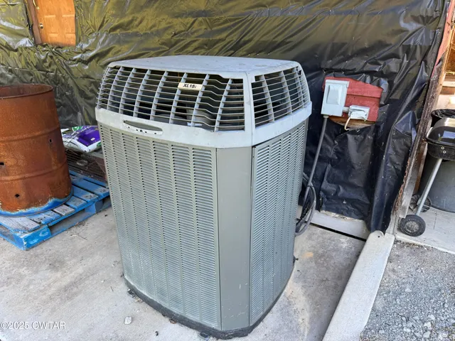 a view of a porch with wooden floor