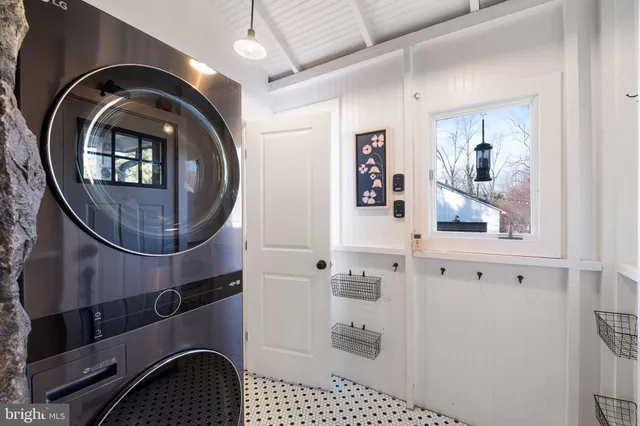 a bathroom with a sink and mirror