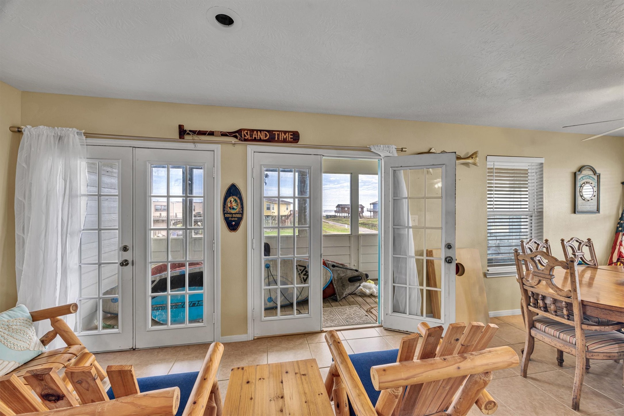 818 Seashell Drive Freeport, TX 77541 - Photo 7 of 23 a living room with furniture windows and wooden floor
