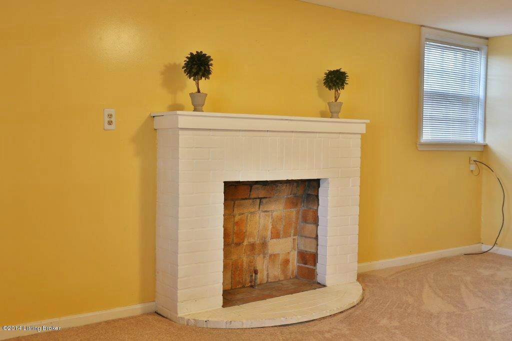 613 Upland Road Louisville, KY 40206 - Photo 34 of 40 Decorative fireplace in basement