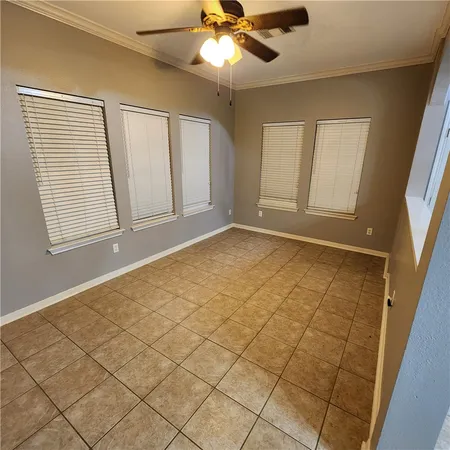 a view of a house with furniture and garden