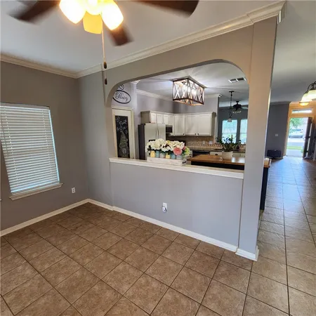 a view of a kitchen and window