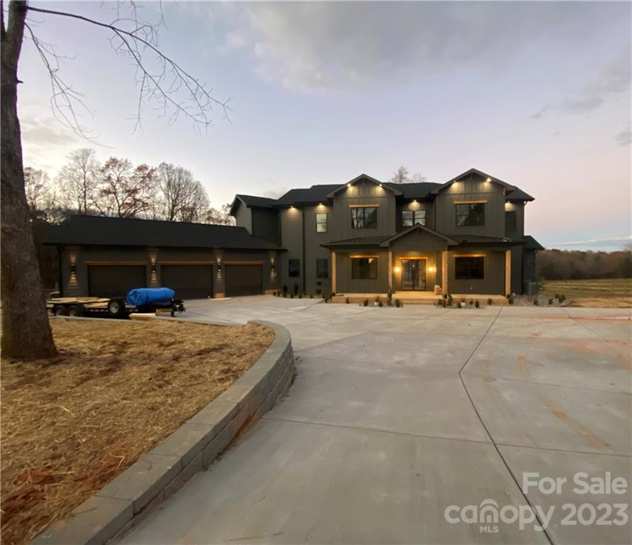 725 Houston Road Troutman, NC 28166 - Photo 2 of 2 a front view of a house with a yard