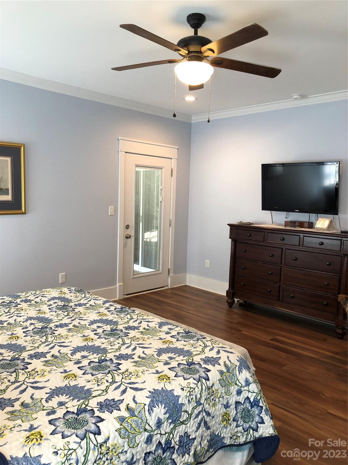 195 Thomas Road Clover, SC 29710 - Photo 17 of 45 a bedroom with a bed and a flat screen tv
