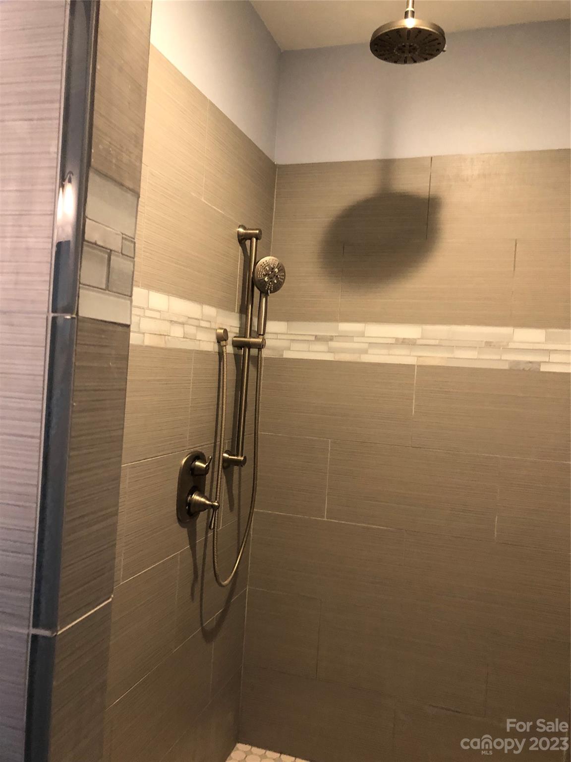 195 Thomas Road Clover, SC 29710 - Photo 20 of 45 a bathroom with a shower