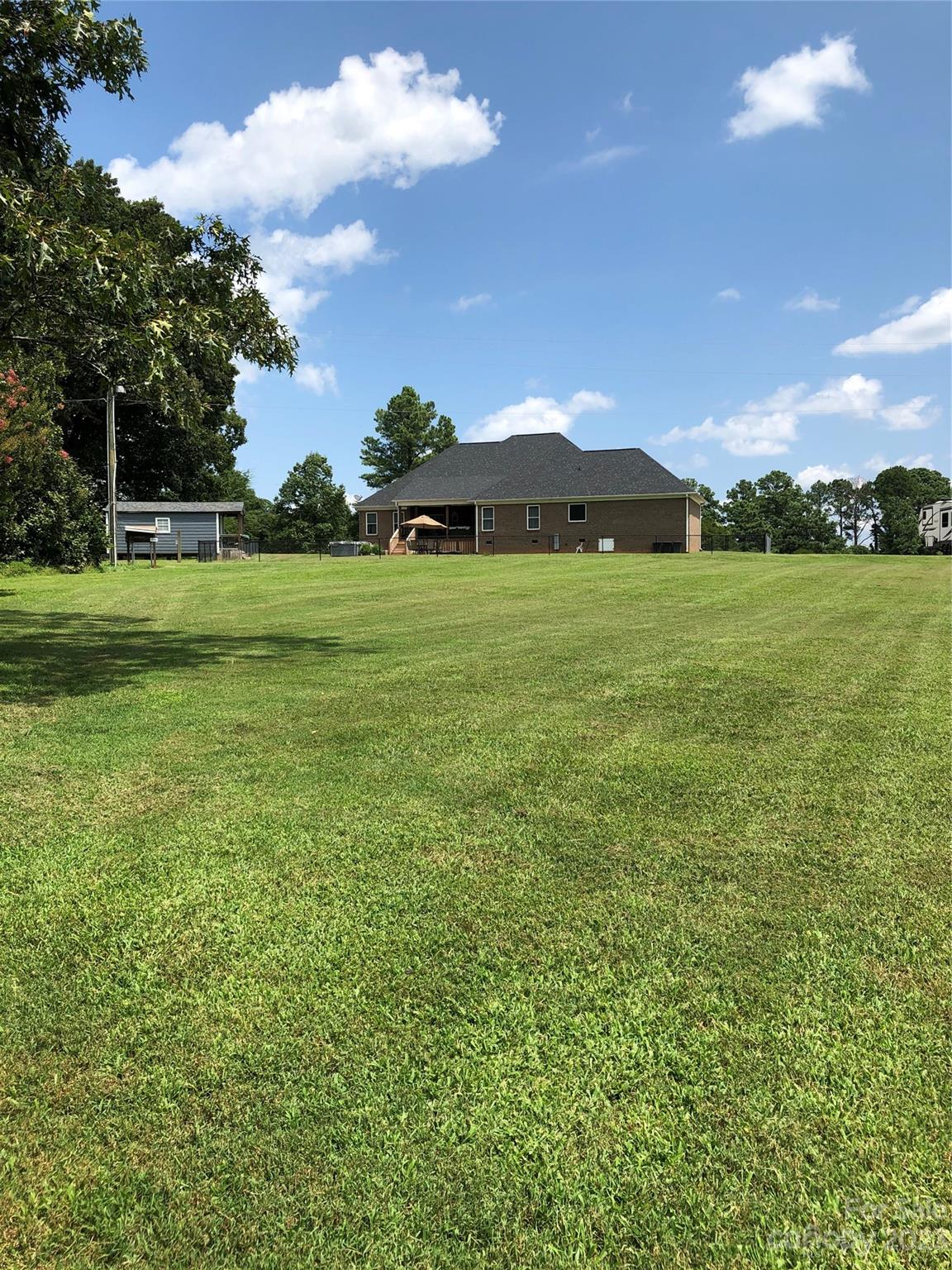 195 Thomas Road Clover, SC 29710 - Photo 38 of 45 a view of a field with an trees