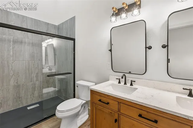 a view of a porch with wooden floor and fence