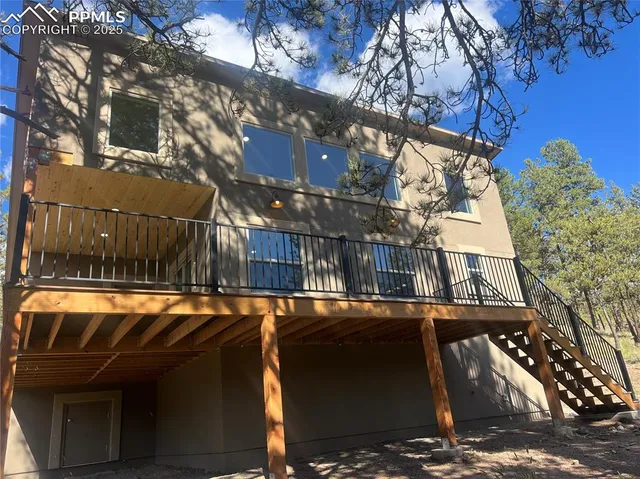 a view of a swimming pool with a yard