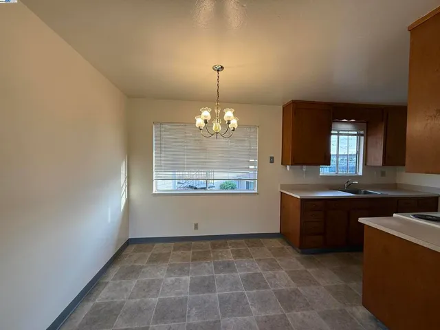 a view of a kitchen and a sink