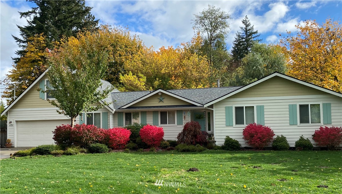 6131 Maytown Road Southwest Olympia, WA 98512 - Photo 1 of 39 a front view of a house with a garden