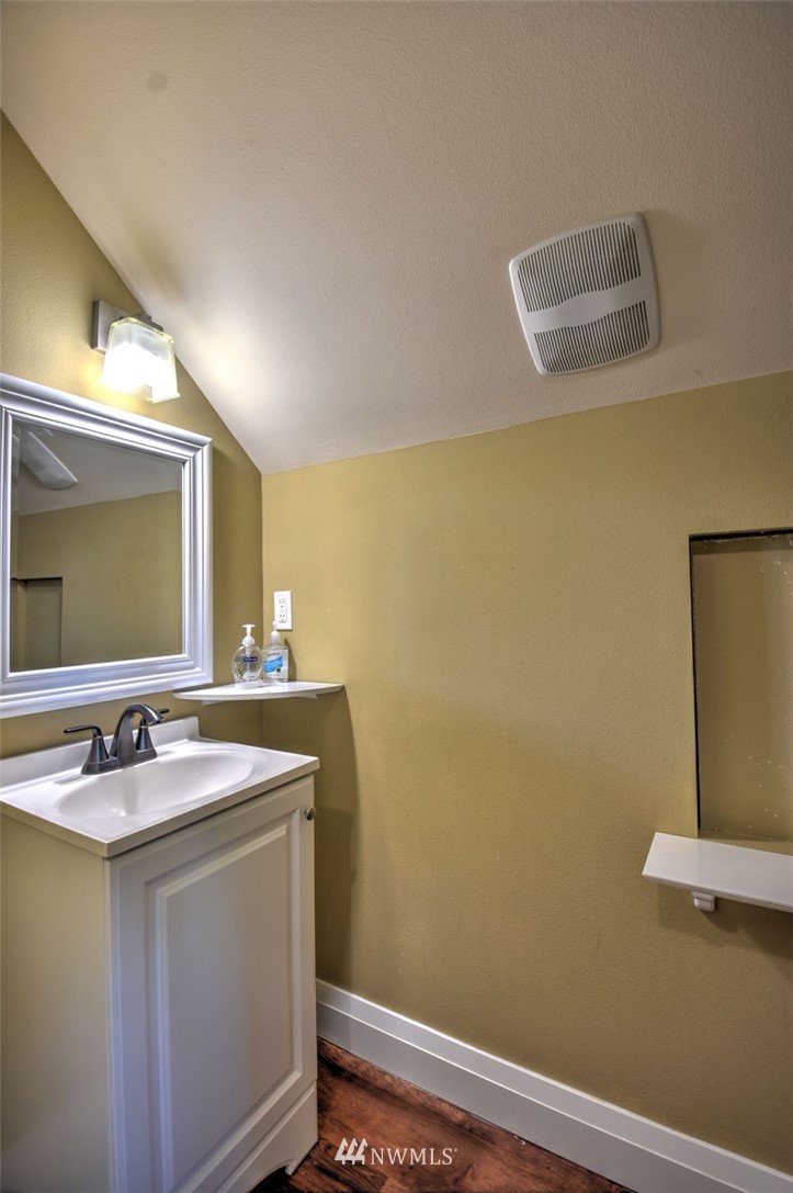 6131 Maytown Road Southwest Olympia, WA 98512 - Photo 24 of 39 a bathroom with a sink and a mirror