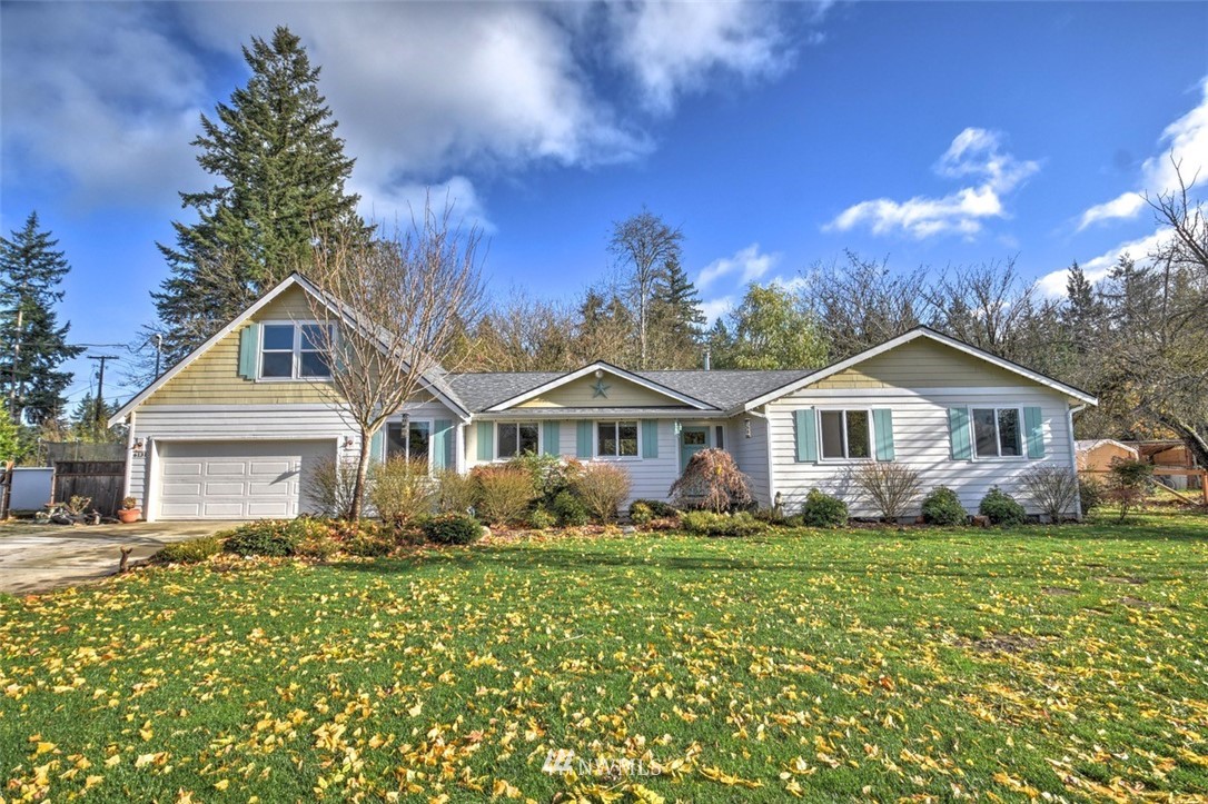 6131 Maytown Road Southwest Olympia, WA 98512 - Photo 26 of 39 a front view of a house with a yard