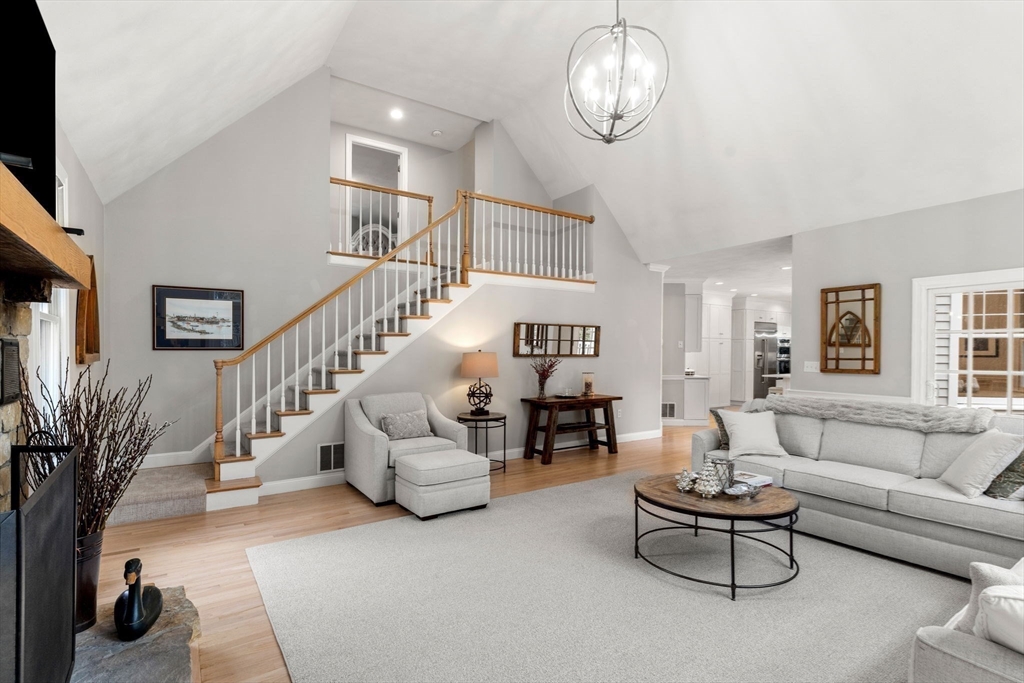 11 Barnside Road Boxford, MA 01921 - Photo 19 of 42 a living room with furniture and a flat screen tv