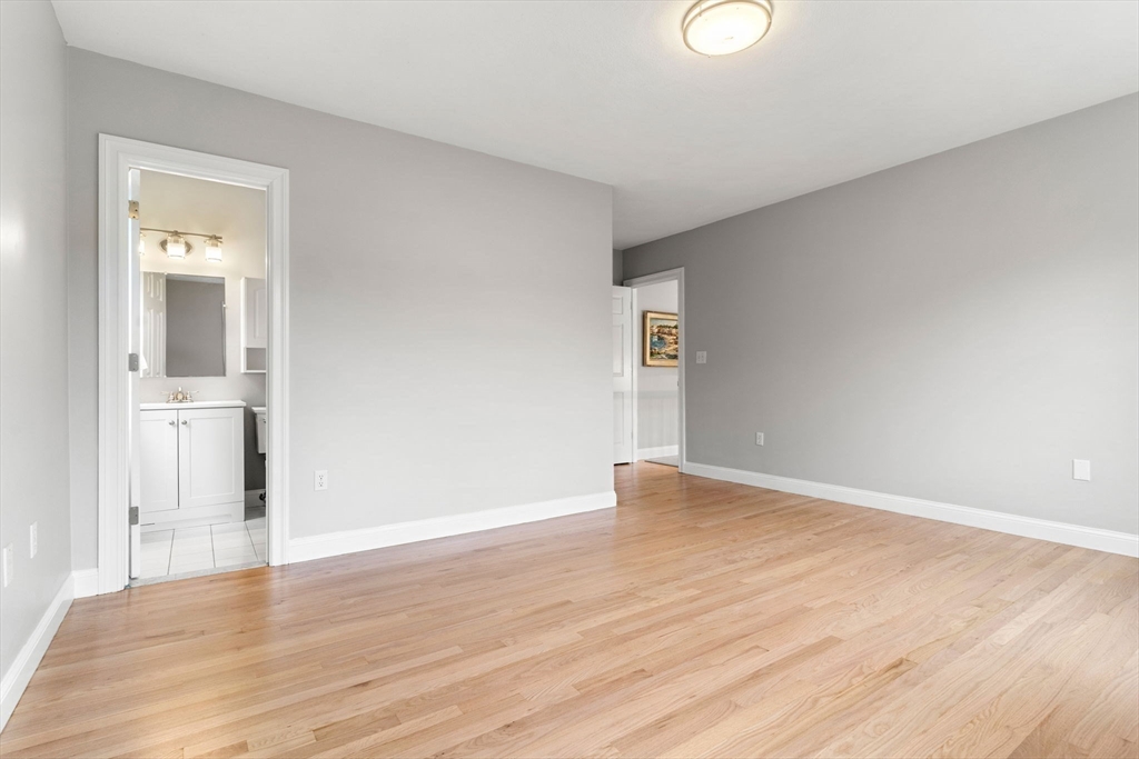 11 Barnside Road Boxford, MA 01921 - Photo 32 of 42 a view of empty room with wooden floor