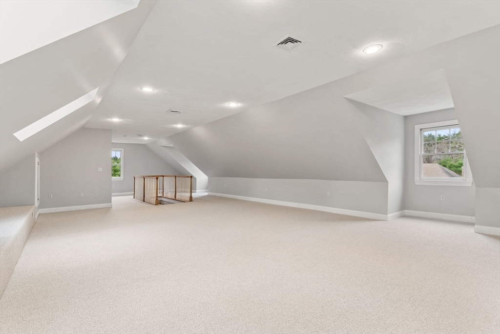 11 Barnside Road Boxford, MA 01921 - Photo 33 of 42 an empty room with windows and pillars in it