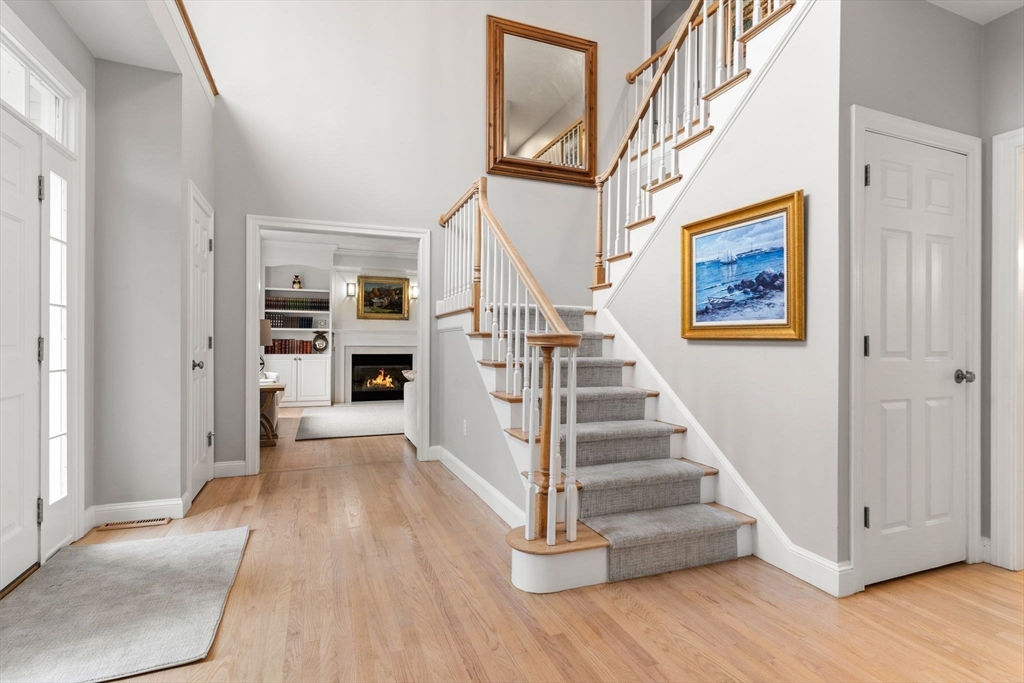 11 Barnside Road Boxford, MA 01921 - Photo 8 of 42 a view of staircase with white walls and a window