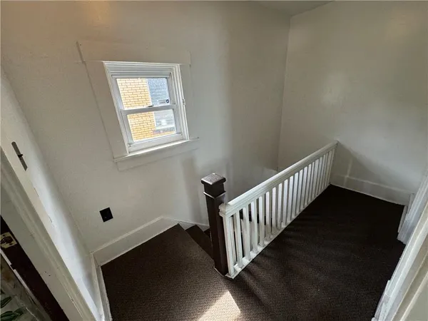 a view of entryway with stairs