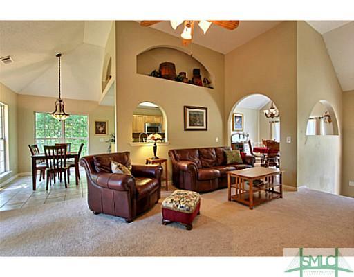 463 Copper Creek Circle Pooler, GA 31322 - Photo 3 of 25 Living Room. Notice the new carpet and high ceilin