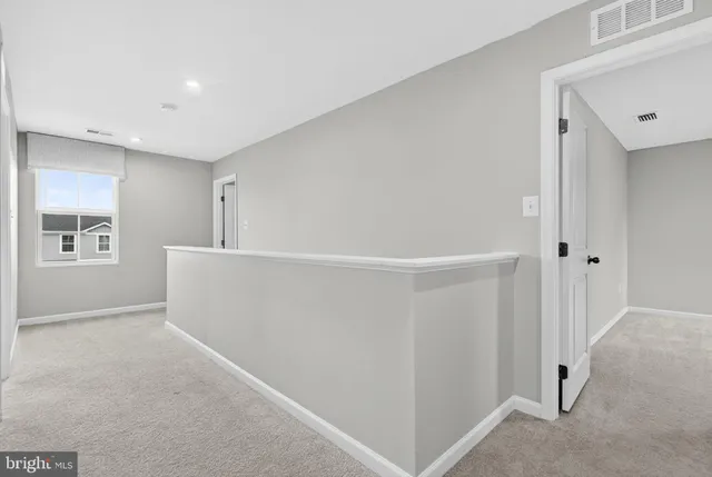 a bathroom with a bathtub and a toilet