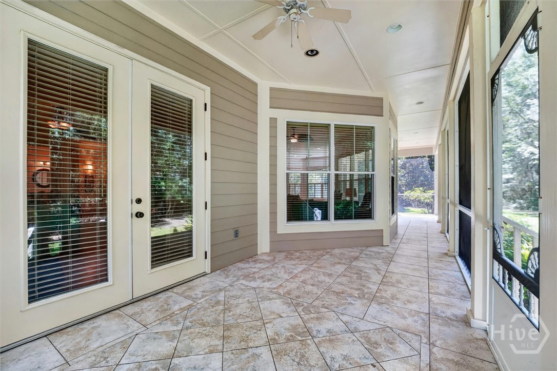 94 Rookery View Drive Midway, GA 31320 - Photo 34 of 46 Huge screened porch that spans the entire back of the home.