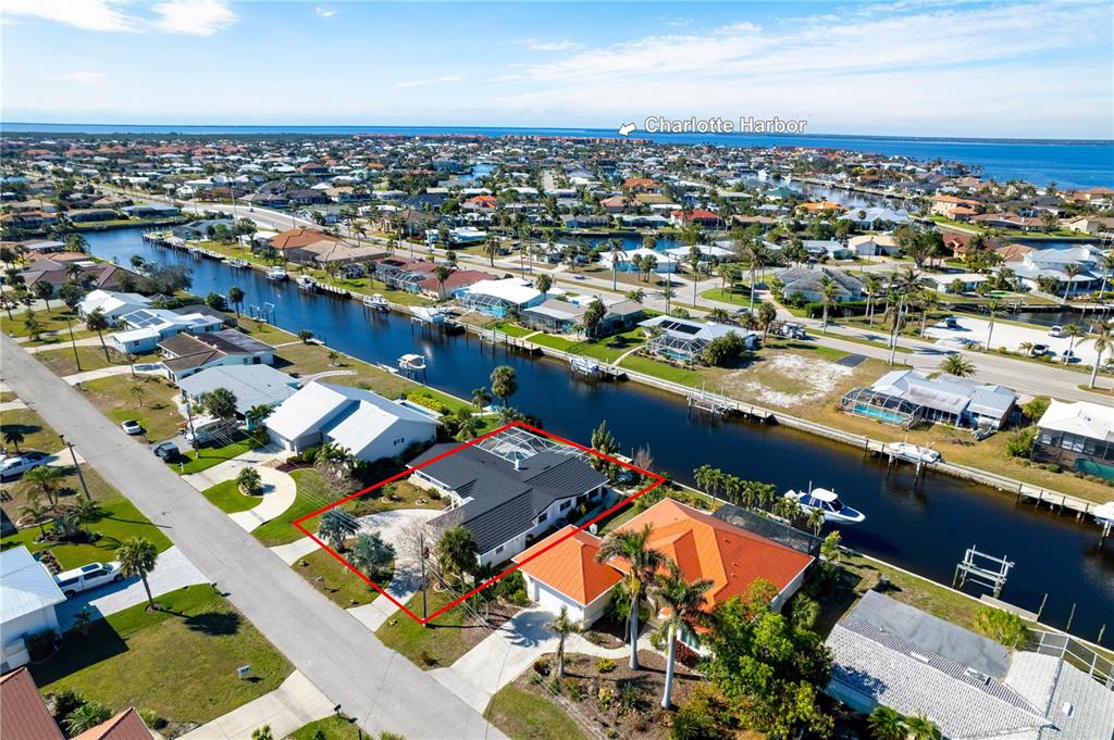 1732 Boca Raton Court Punta Gorda, FL 33950 - Photo 14 of 64 an aerial view of a city with lots of residential buildings