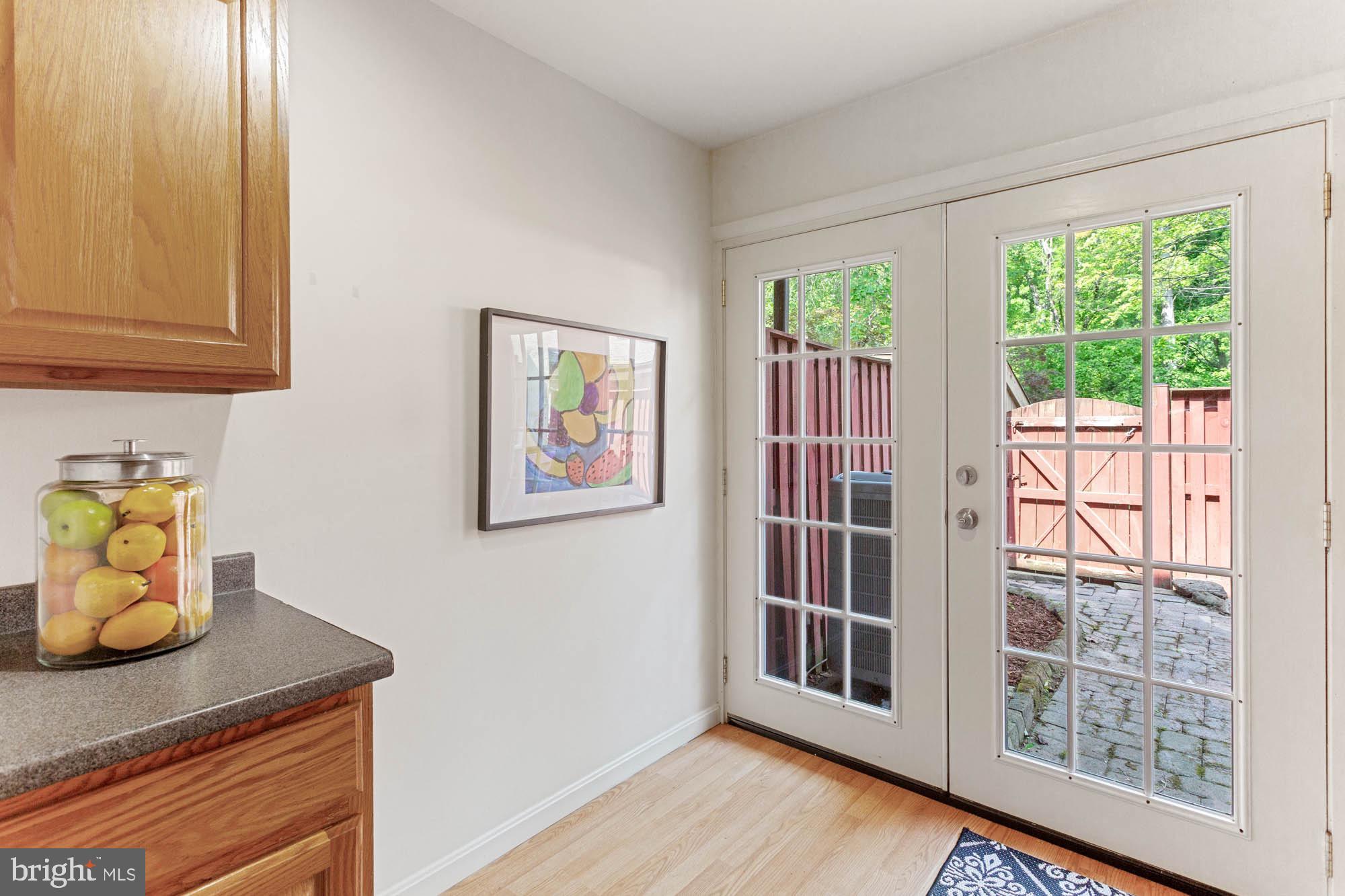 11241 Crystal Run, Unit B289 Columbia, MD 21044 - Photo 14 of 33 UPGR LIGHT ENGINEERED OAK FL W/ FRENCH DOORS