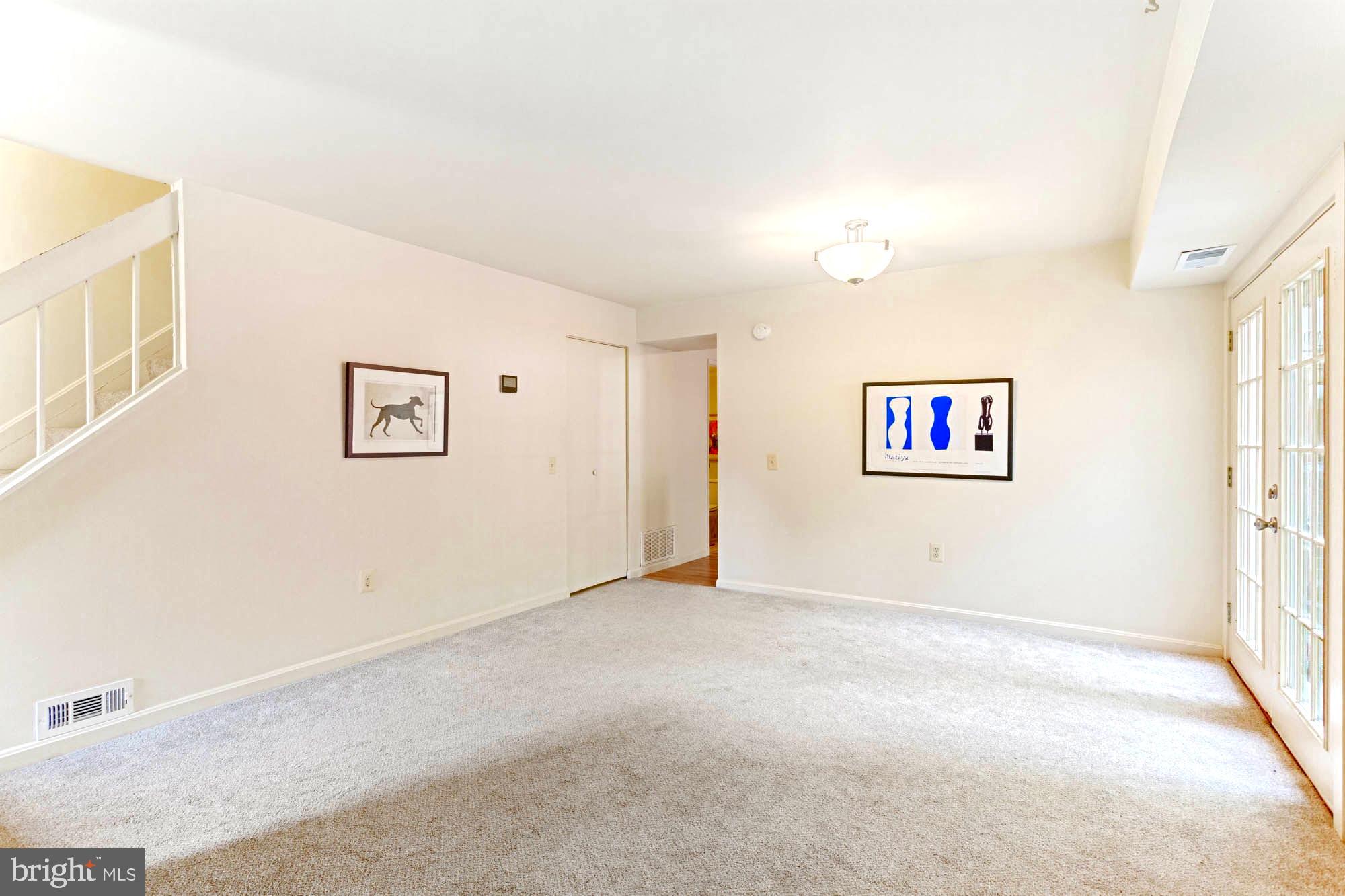 11241 Crystal Run, Unit B289 Columbia, MD 21044 - Photo 10 of 33 DINING AREA HAS AN UPGR LIGHT &UPGR FRENCH DOORS